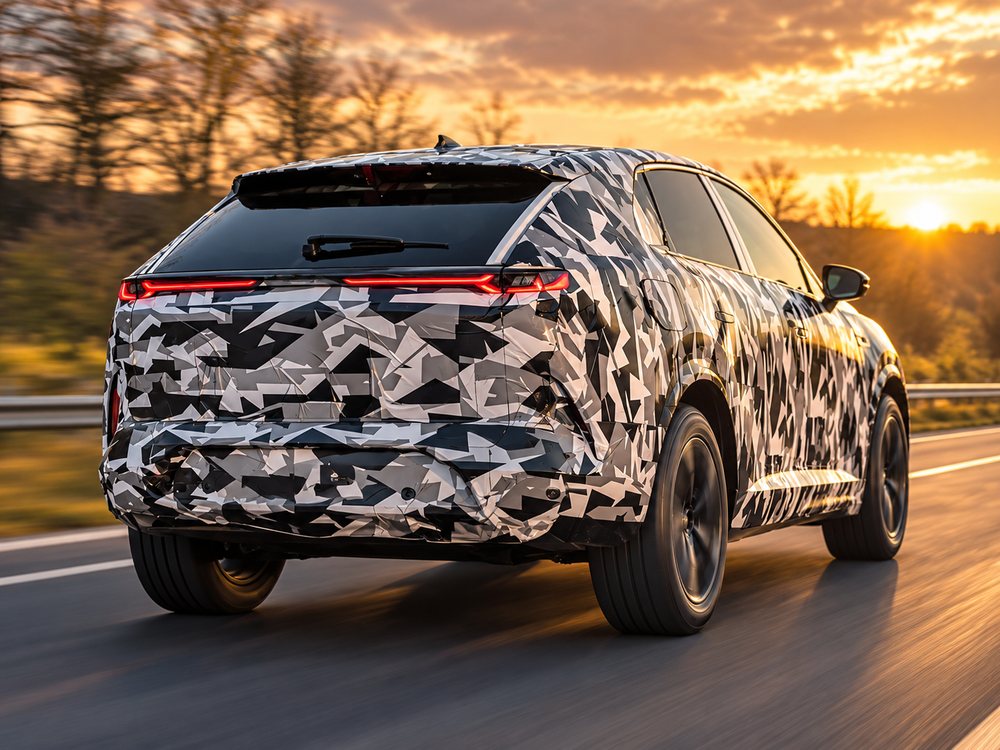 Camouflaged prototype car spotted on the highway